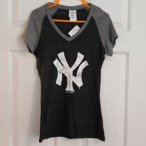 New York Yankees shirt.